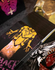 Collection of graphic cards with artistic designs on a dark surface