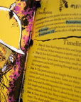 Book open to a page with a colorful illustration of a bird and text on osteopetrosis.