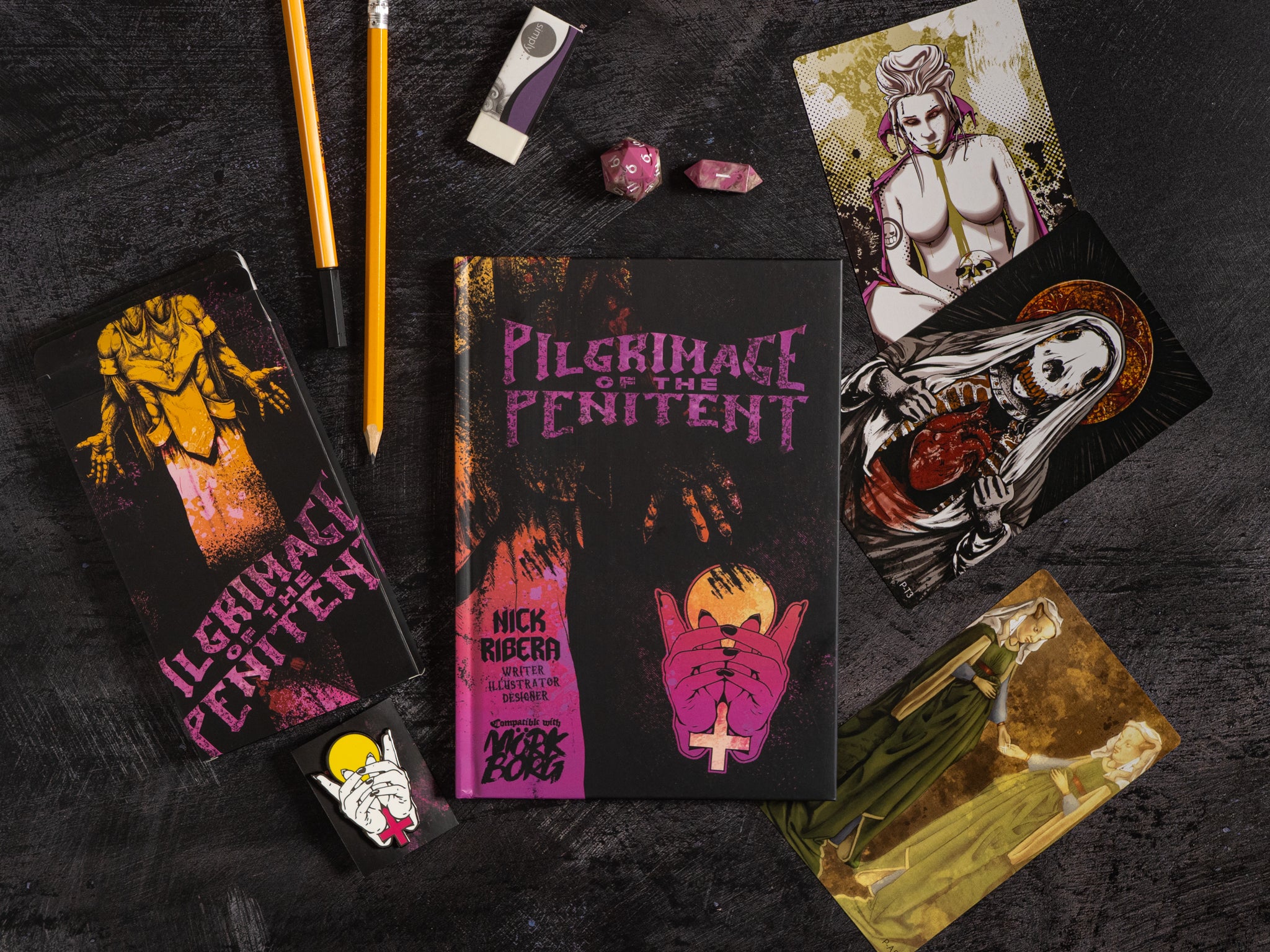 Book titled 'Pilgrimage of the Penitent' with artwork on a dark surface
