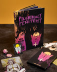 Book titled 'Pilgrimage of the Penitent' with artistic covers on a dark surface.