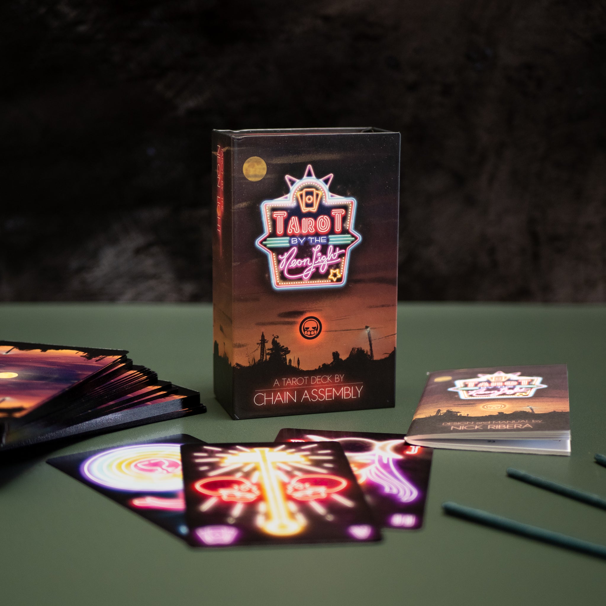 Tarot cards by the Neon Light Club with a dark background
