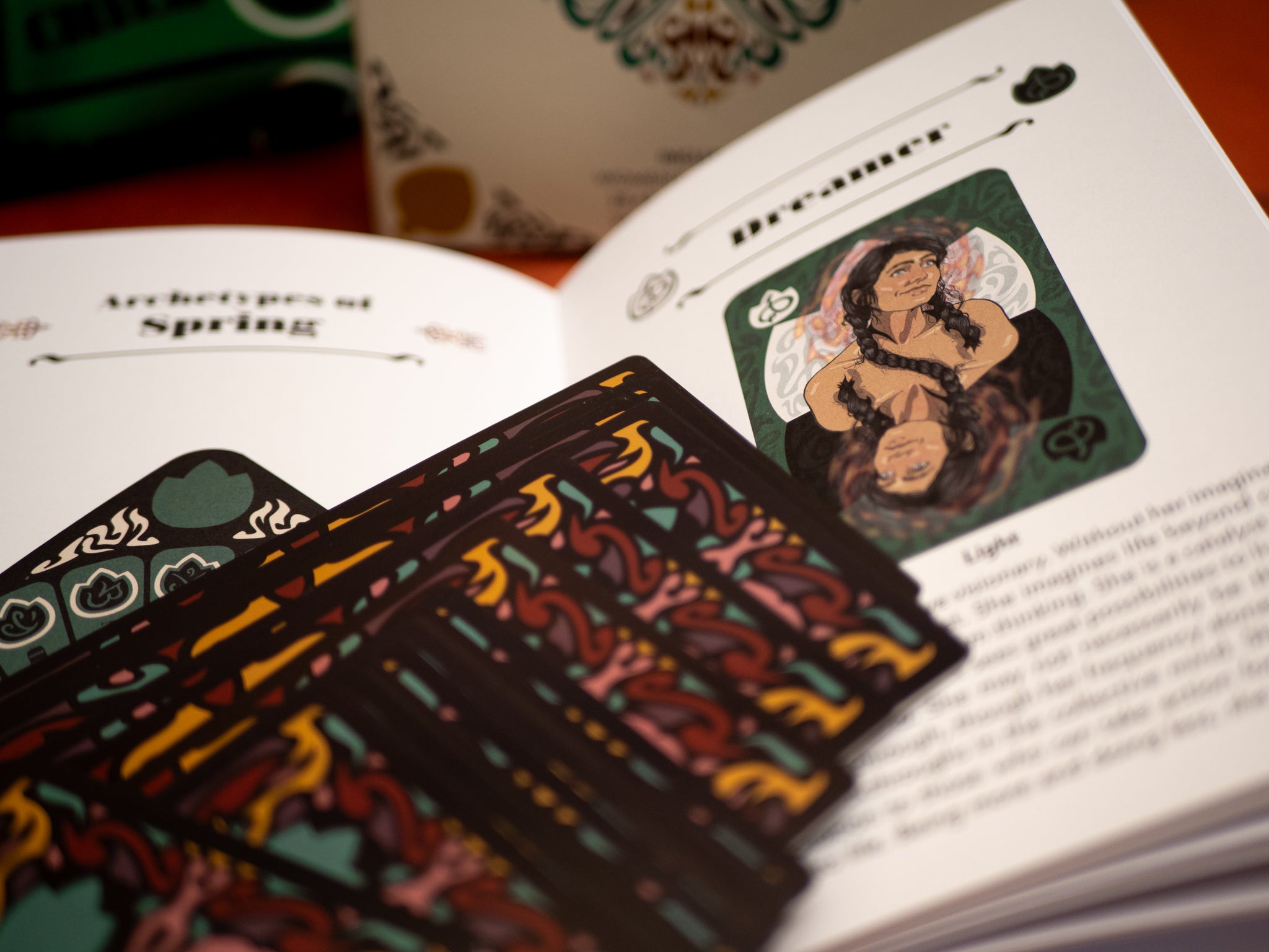 Card deck with colorful designs on a book